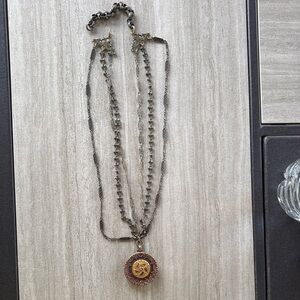 Elegant Gold and Silver Pendant Necklace